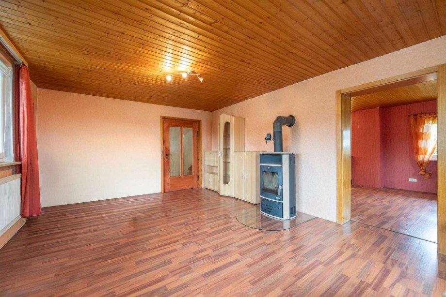 Wohnzimmer Anbau mit Kamin Zweifamilienhaus Neustadt bei Coburg